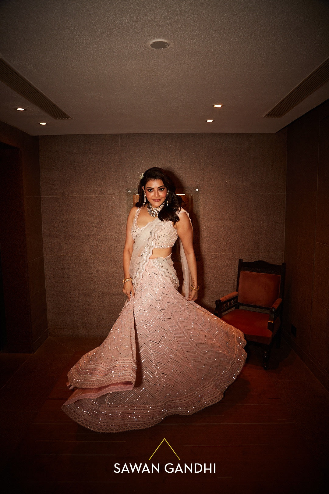 Kajal aggarwal in peach mirror work lehenga set – Sawan Gandhi Online Store