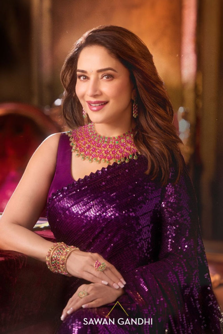 Madhuri Dixit in Wine to grey sequin saree