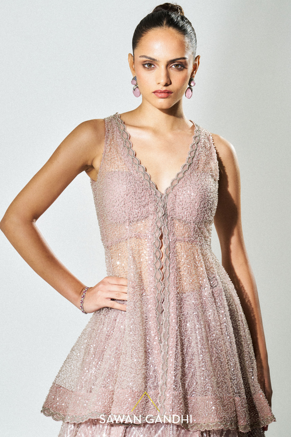 Dusky pink peplum sequins lehenga