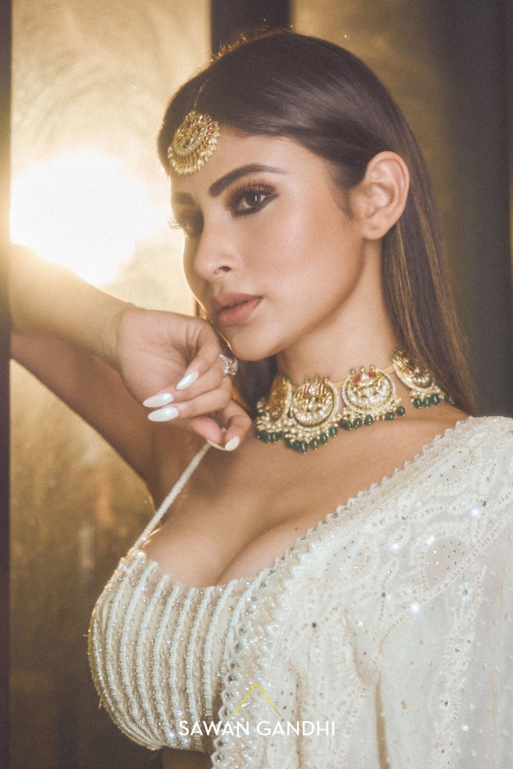 Mouni Roy in Ivory sequins lehnga set