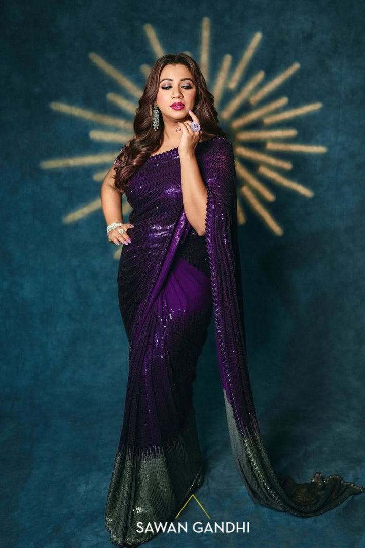 Shreya Ghosal in Wine to grey sequin saree