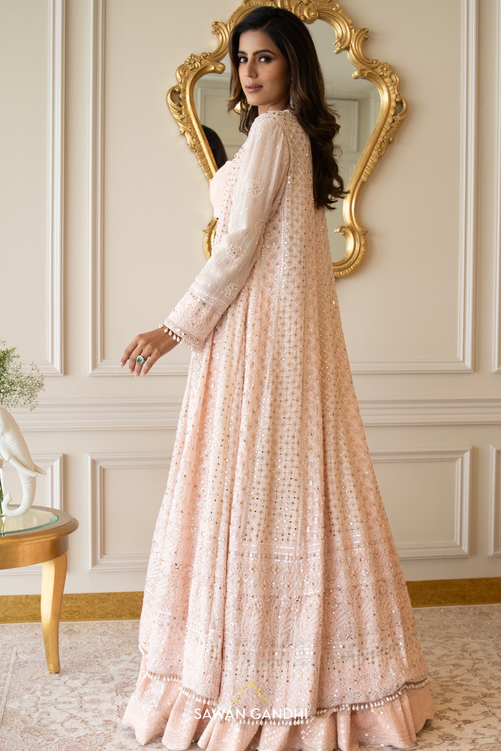 Peach sequins lehenga with Chikankari cape