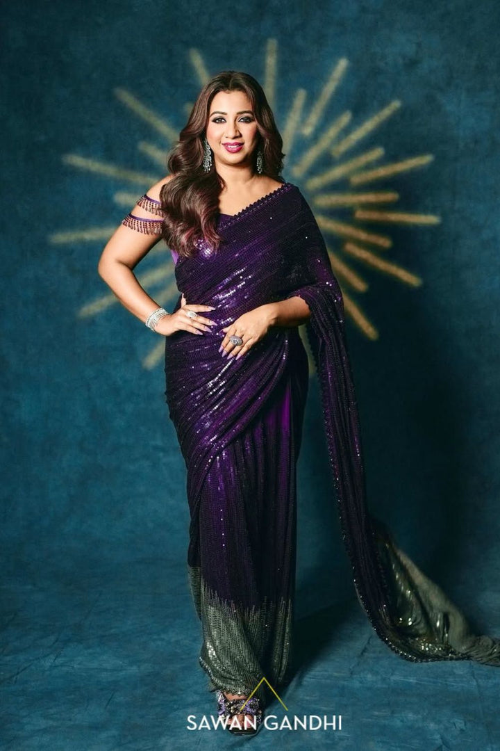 Shreya Ghosal in Wine to grey sequin saree