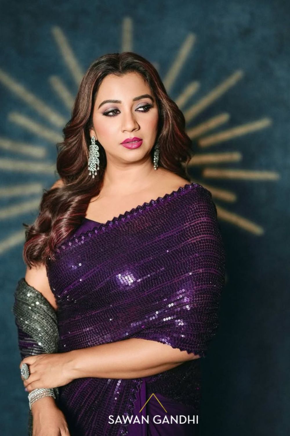 Shreya Ghosal in Wine to grey sequin saree