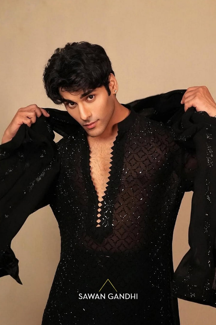 Tushar Khanna in Black swarosvki jaal kurta with stole
