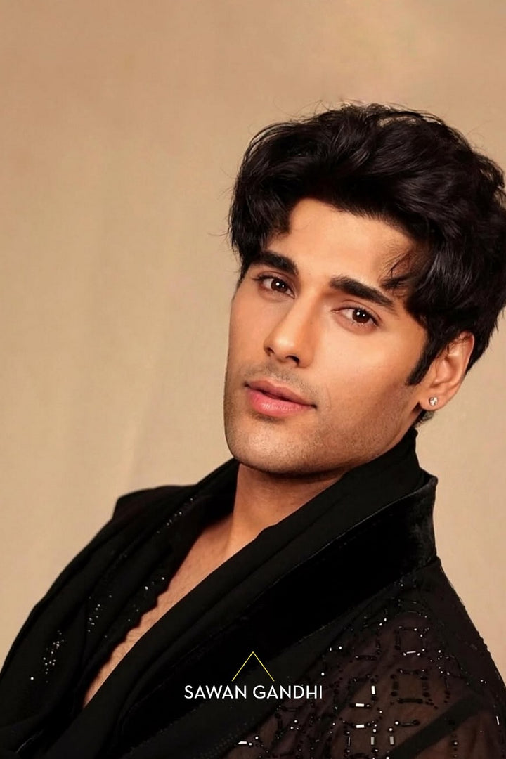 Tushar Khanna in Black swarosvki jaal kurta with stole