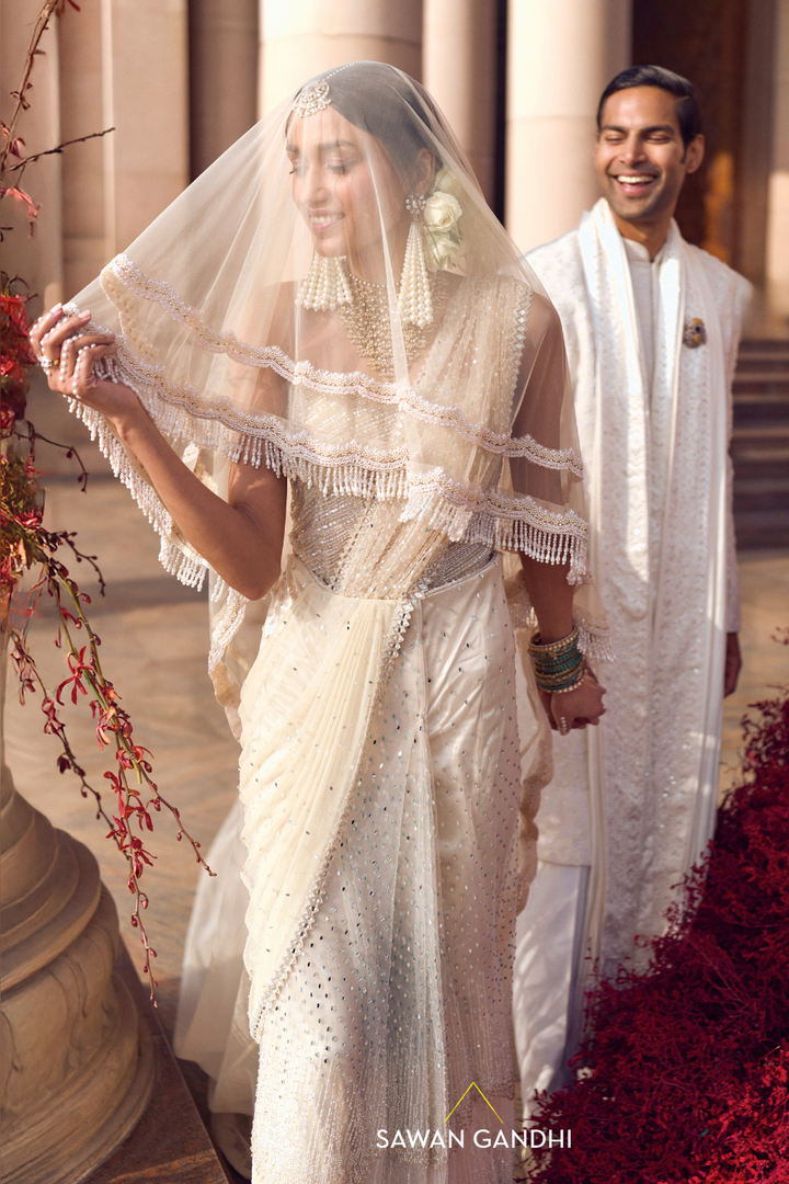 IVORY DRAPED SAREE WITH EMBELLISHED CORSET