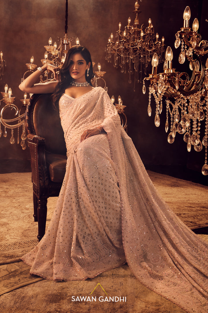 Ivory and pink chikankari saree