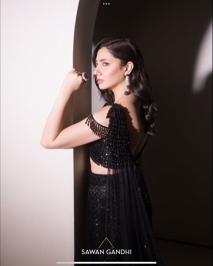Mahira Khan in Black crystal work fish cut drape skirt set