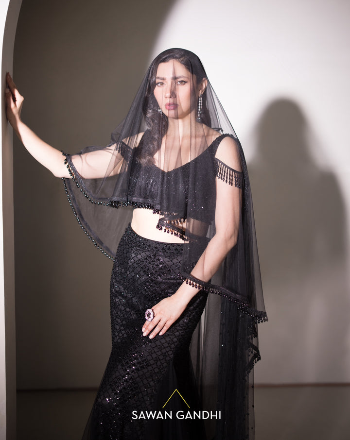 Mahira Khan in Black crystal work fish cut drape skirt set