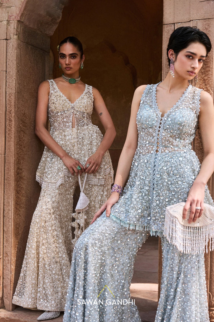 Ivory Cutdana And Sequins Peplum Set