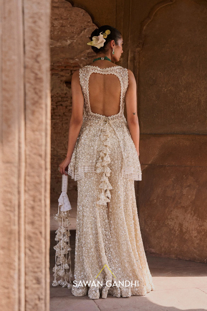 Ivory Cutdana And Sequins Peplum Set