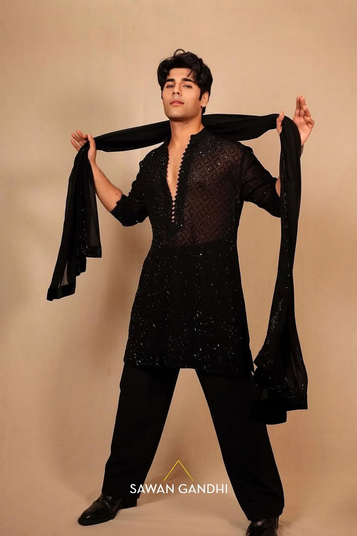 Tushar Khanna in Black swarosvki jaal kurta with stole