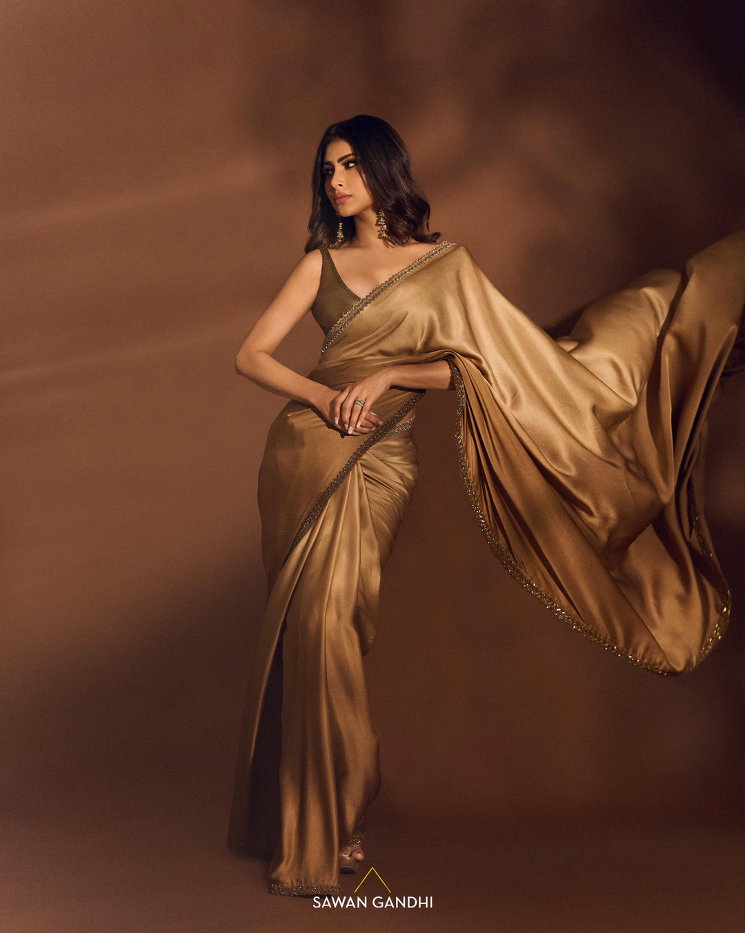 Mouni Roy in Gold ombré saree