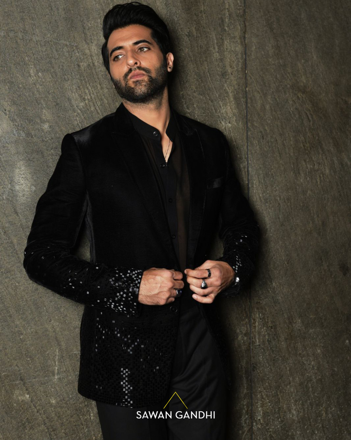 Akshay Oberoi in Noir cutdana scattered down jacket