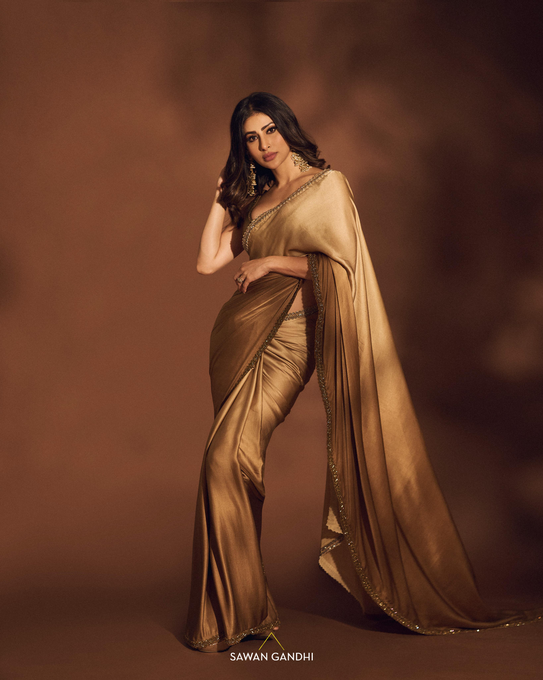 Mouni Roy in Gold ombré saree