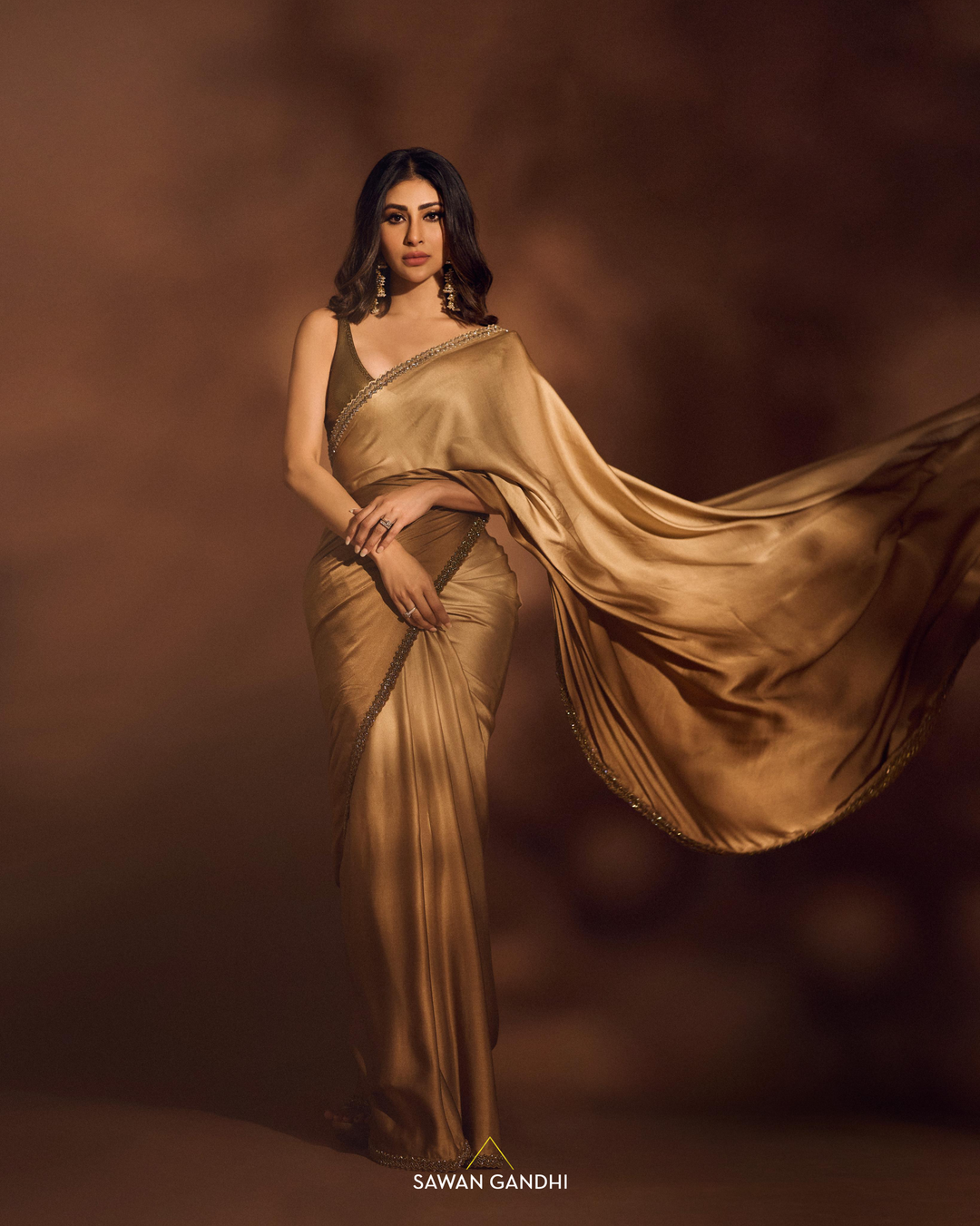 Mouni Roy in Gold ombré saree