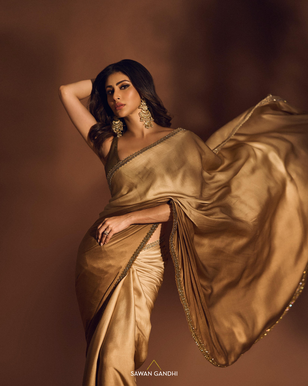 Mouni Roy in Gold ombré saree