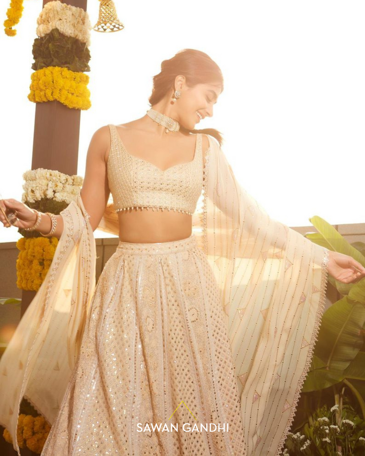 Pooja hegde in Gold chikankari lehenga set