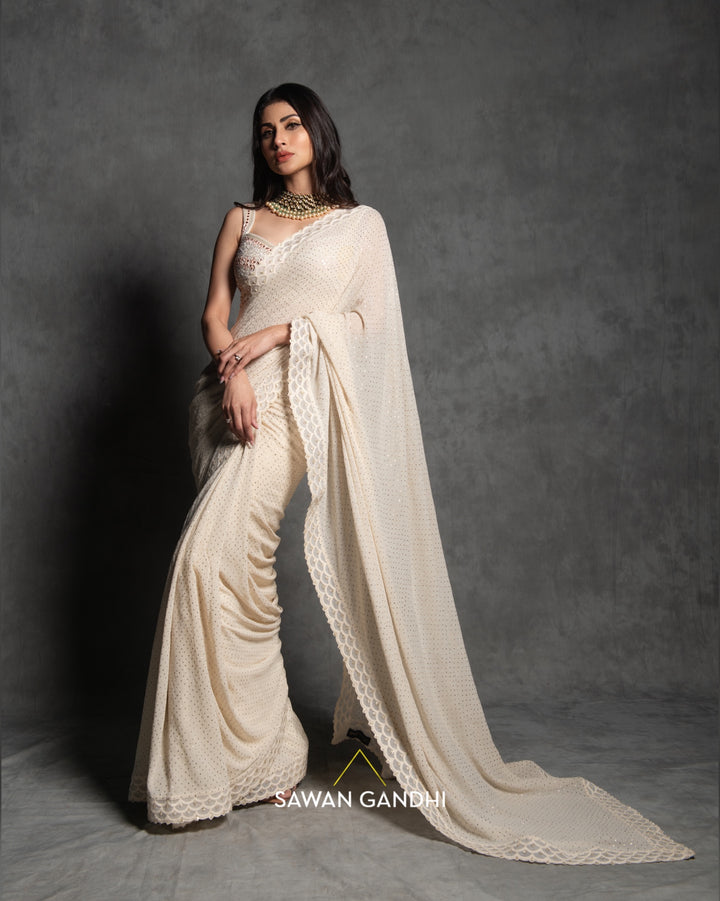 Mouni Roy in Ivory mukaish work saree
