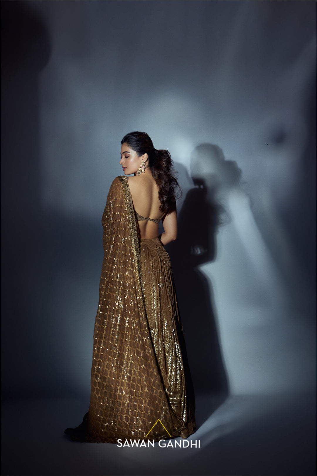 Rashmika Mandanna in Coffee gold sequins lehnga set