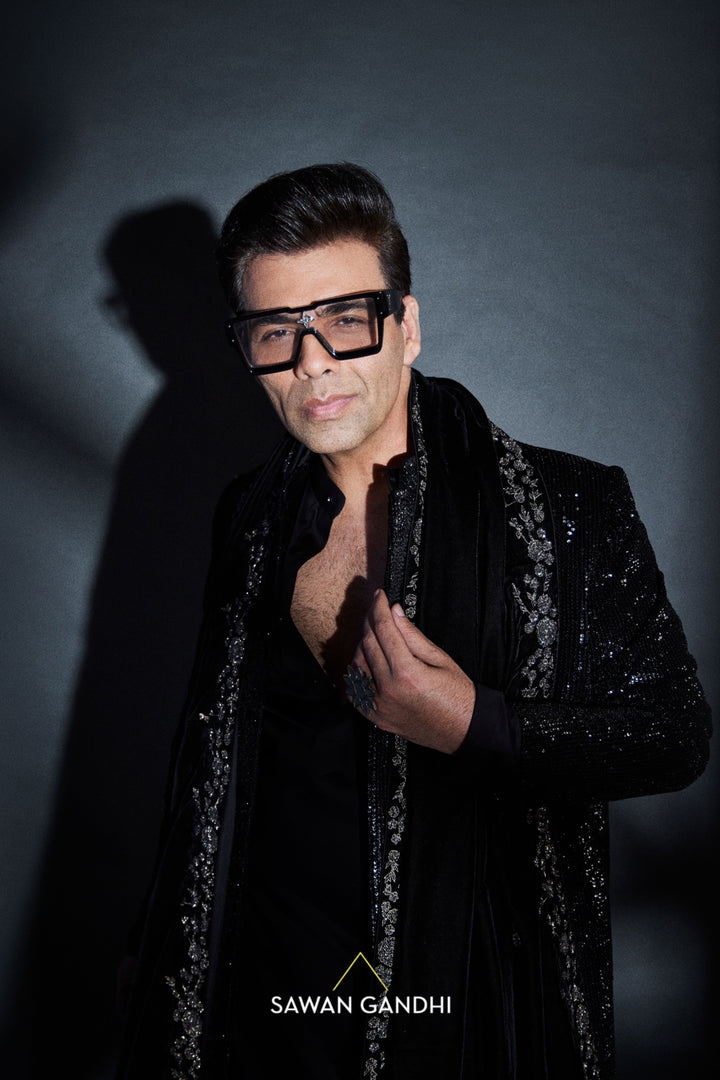 Karan Johar in Black sequins sherwani with stole